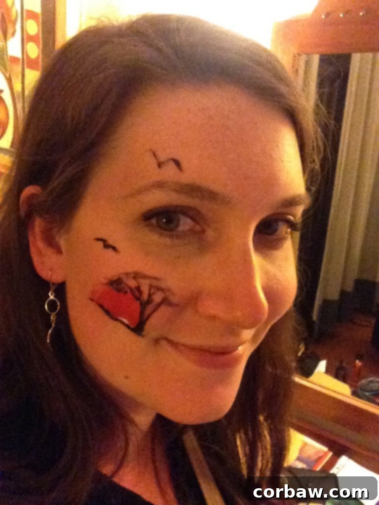 Author and fiancé in traditional wraps with face paint at The Boma dinner in Victoria Falls, enjoying the cultural experience.