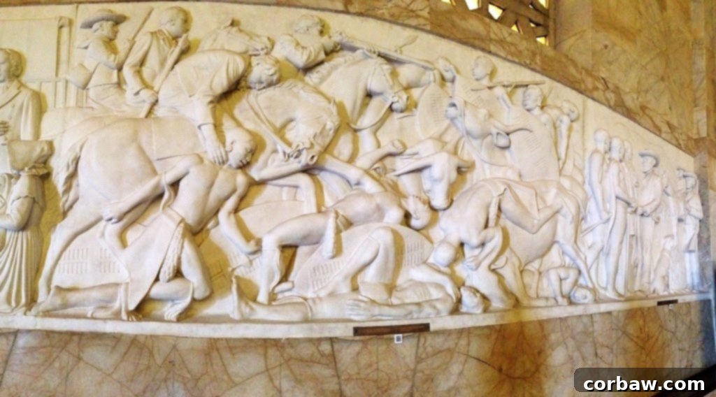 Another segment of the Great Trek frieze, showing a battle scene.