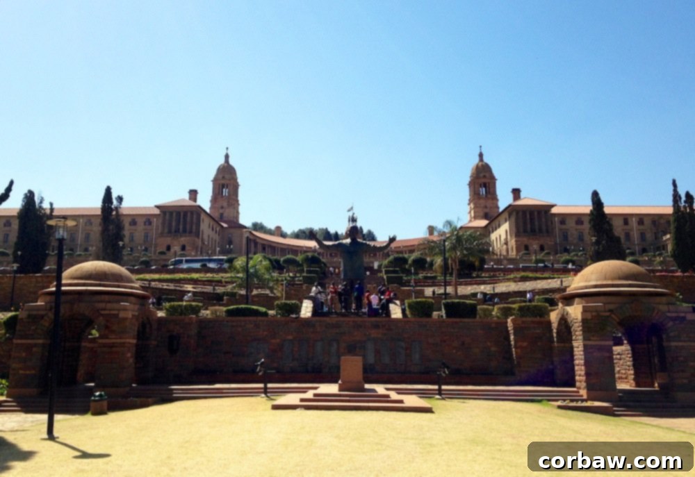 Panoramic view of the Union Buildings in Pretoria, showcasing its grand architecture and surrounding gardens.