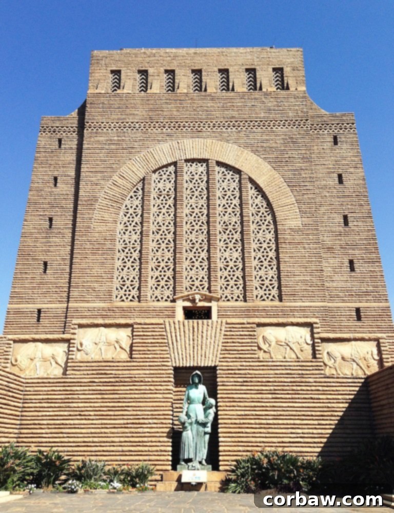 Interior view of the Voortrekker Monument's Hall of Heroes with ornate wall friezes.