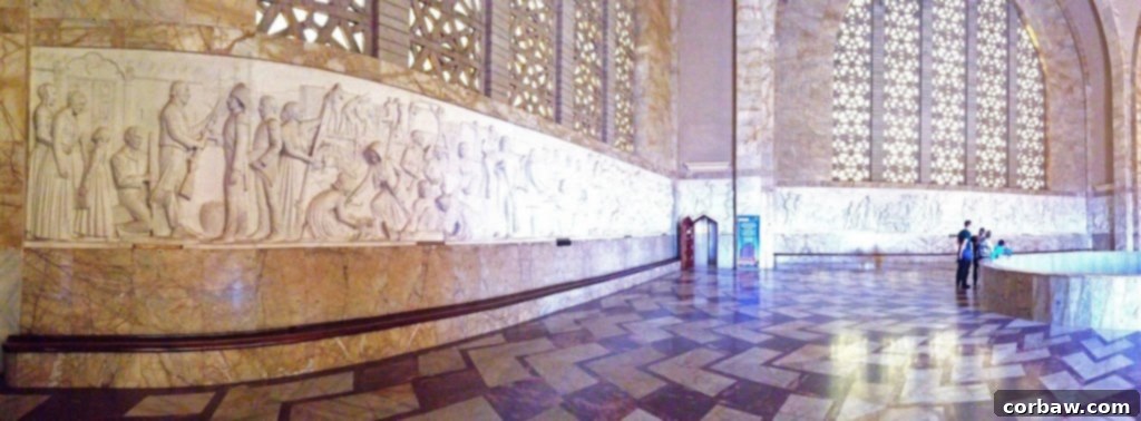 Detailed section of the marble frieze inside the Hall of Heroes, depicting historical scenes.