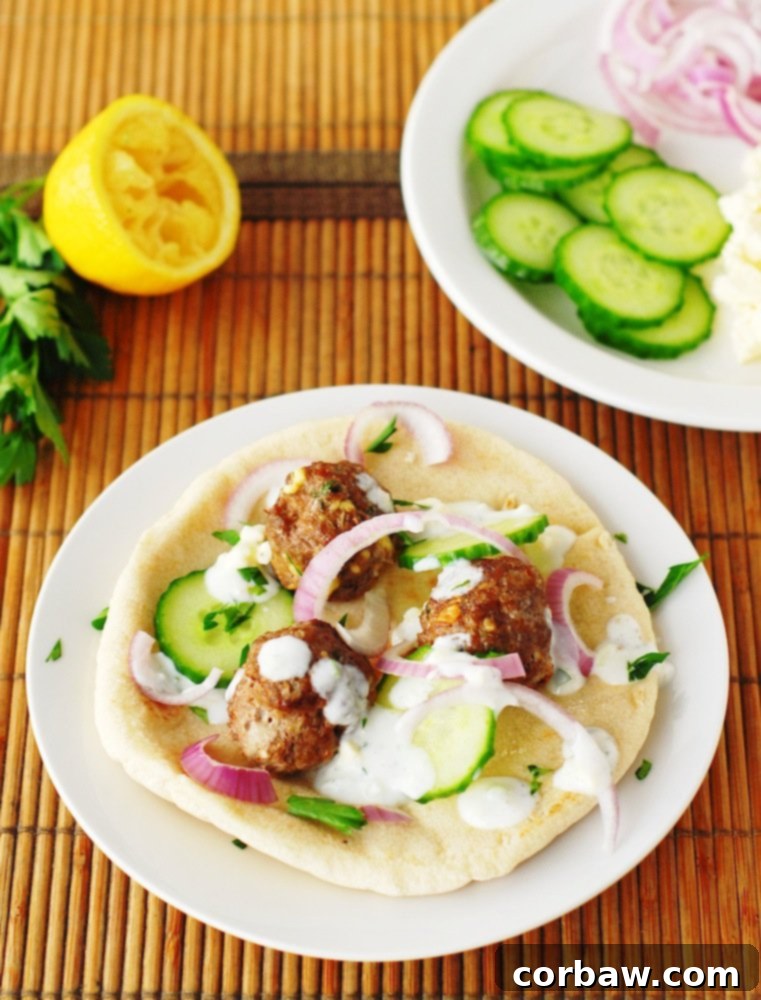 Delicious Greek meatballs with feta tzatziki sauce.