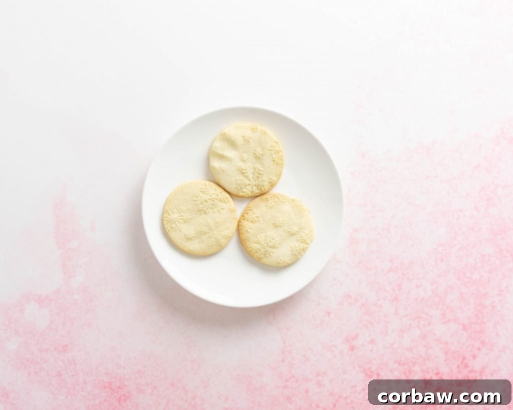 Close-up of sugar cookies with embossed snowflake patterns