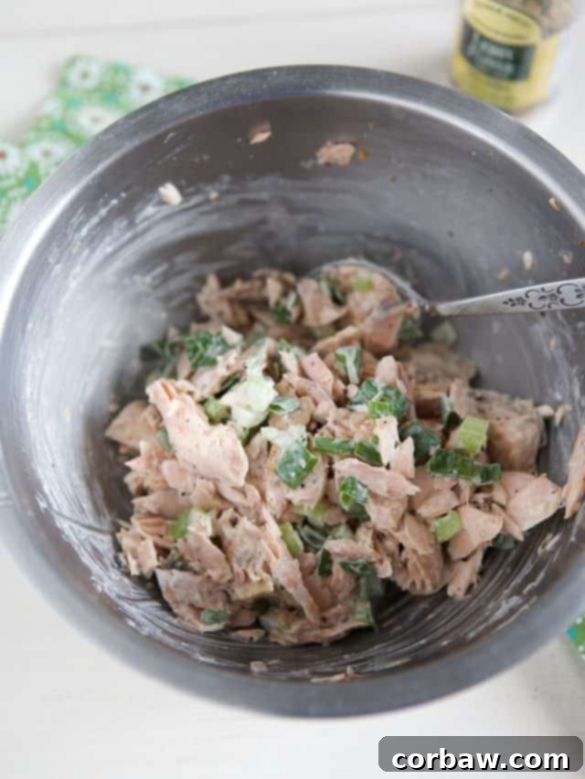 Simple & Satisfying Salmon Salad 4 bowl of salmon salad mixed with mayo and lemon pepper