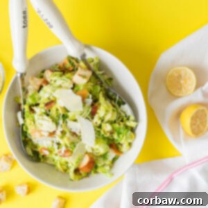 Mastering Steak Sides: 20+ Perfect Pairings and Pitfalls 12 Warm Brussels Sprouts Caesar Salad in a bowl, a flavorful steak side