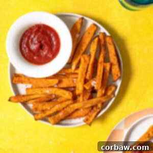 Mastering Steak Sides: 20+ Perfect Pairings and Pitfalls 5 Air Fryer Sweet Potato Fries on a plate with dipping sauce