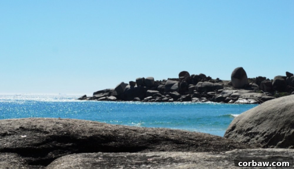 Another scenic view from atop the boulders, overlooking the beautiful beach and ocean.