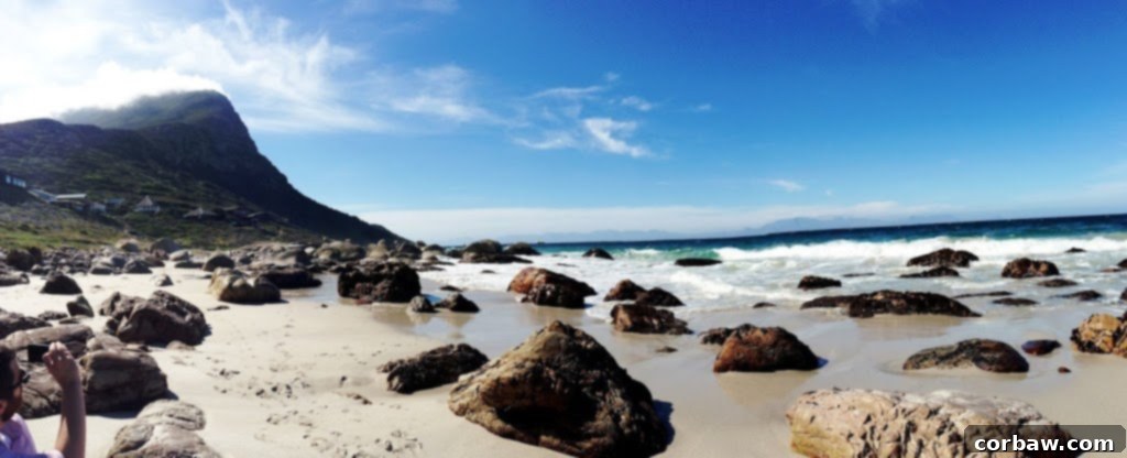 Beautiful secluded beach in Cape Town with warm turquoise water and white sand.