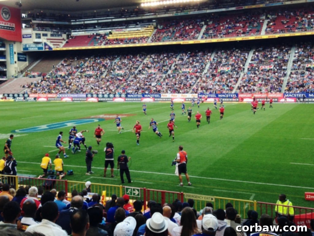 SA Sunday Rugby Showdown 4 Long queue of people waiting outside a stadium for ticket collection.