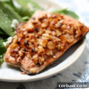 Almond Crusted Honey Mandarin Salmon ready to serve with a side of salad