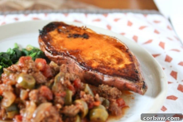 Skinnytaste Slow Cooker Picadillo served with brown rice and spinach