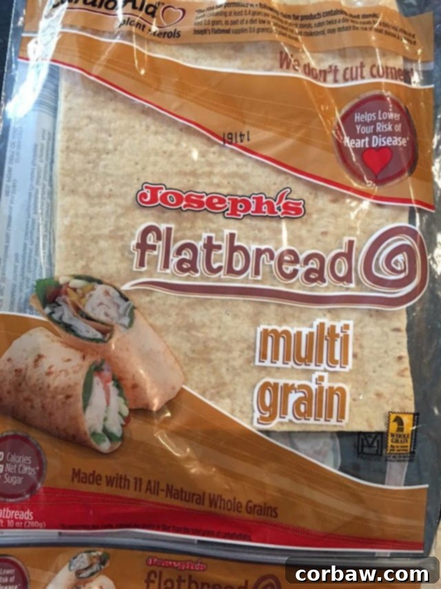 Savory Chicken, Broccoli and Red Pepper Flatbread Pizza 4 Freshly baked Chicken, Broccoli, and Red Pepper Flatbread Pizza ready to serve