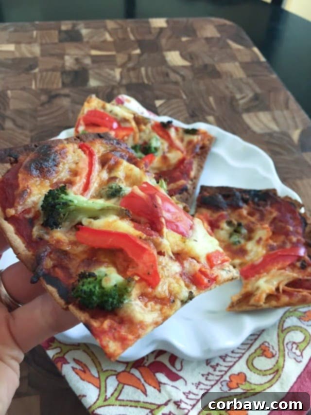 Savory Chicken, Broccoli and Red Pepper Flatbread Pizza 5 Uncooked Chicken, Broccoli, and Red Pepper Flatbread Pizza before baking