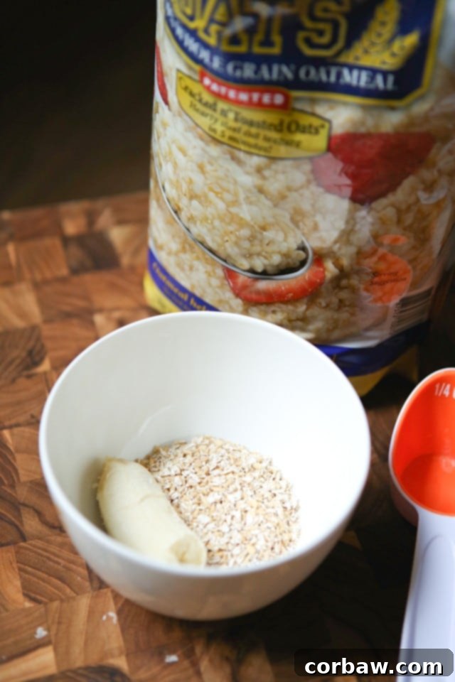 A close-up of creamy oatmeal with vibrant blueberries and sliced banana, a perfect kid-friendly and healthy breakfast option
