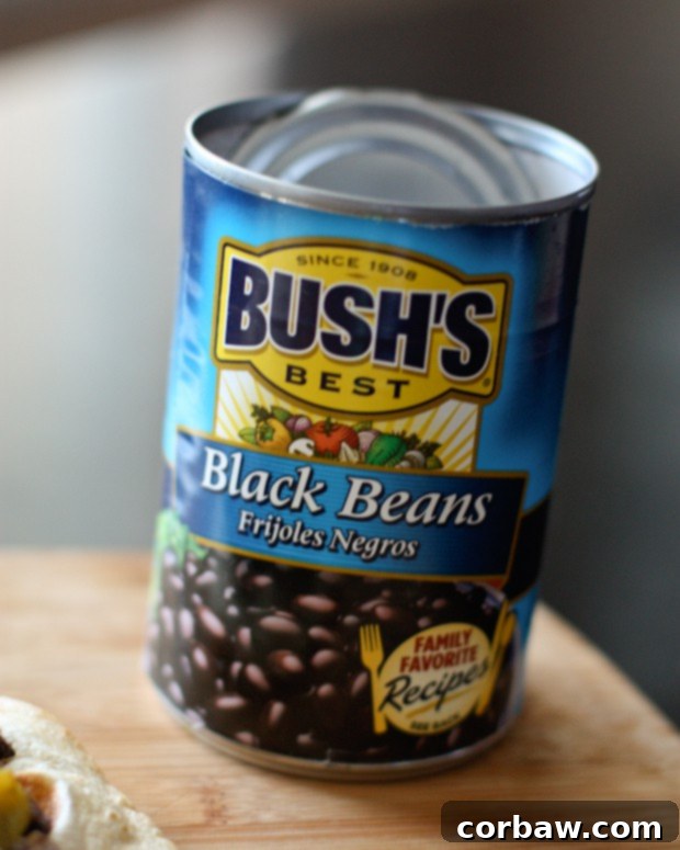 This Mango Avocado and Black Bean Salsa recipe is one you'll want to hang on to! Perfect for dipping with chips, in tacos or over grilled chicken. Recipe via aggieskitchen.com This Mango Avocado and Black Bean Salsa recipe is one you'll want to hang on to! Perfect for dipping with chips, in tacos or over grilled chicken. Recipe via aggieskitchen.com